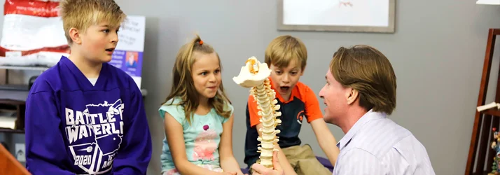 chiropractor sees children for wellness chiropractic care