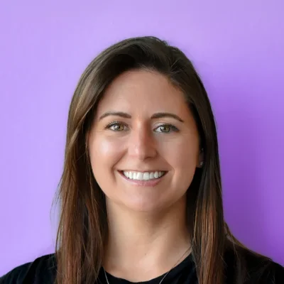 A headshot photo of Cassie