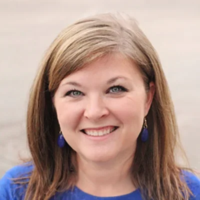 A headshot photo of Katie