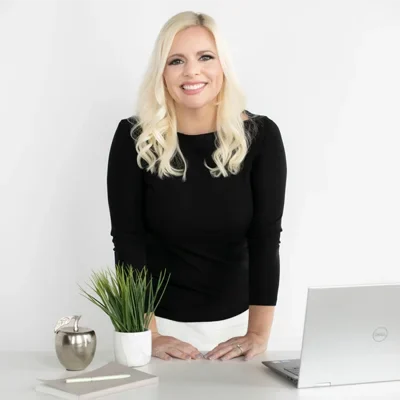 A headshot photo of Paige