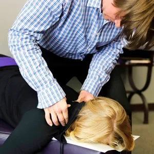 Wes Nyberg adjusting a patient